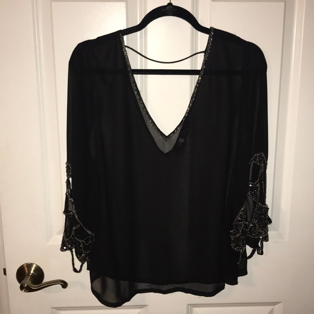 BKE Boutique blouse with sequined sleeves